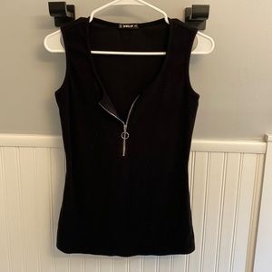 Sleeveless black top . Size small